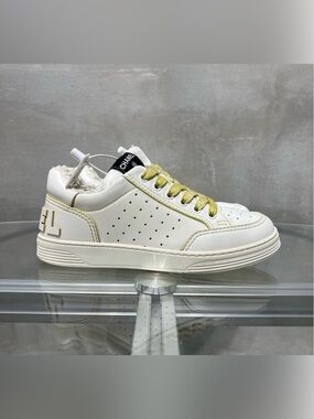 CHANEL White Leather Sneakers with Yellow Accents
